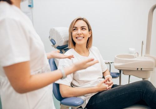 Lady smiles at dentist