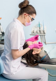 Woman getting a dental cleaning