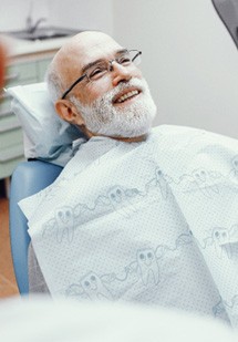 Man smiling in the dental chair